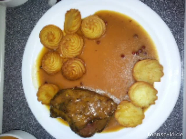 Barbarie-Entenbrust mit Orangen-Pfeffersoße, Herzoginkartoffeln und Apfelrotkohl