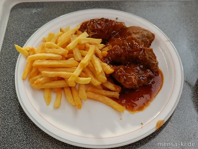 Winzerknorze (5,Sw,Sl,Sf,A,S) mit Schmorzwiebelsoße (5,Gl,Sw,A) und Pommes frites, dazu ein Beilagensalat nach Wahl