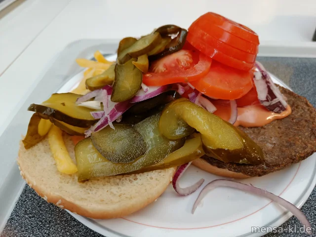 Burger mit Brötchen und verschiedenen Zutaten zum selbst belegen (1,9,Gl,Ei,Sl,Sf,Se,R), dazu Pommes frites
