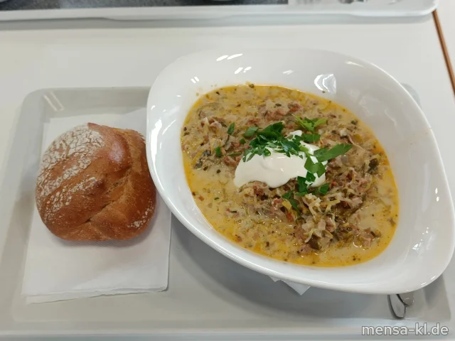 Käse-Lauch-Eintopf mit Hackfleisch (2,Gl,La,So,R,S), dazu ein Roggenbrötchen (Gl,Se,So)