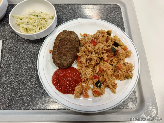 Hacksteak "Croatia" (Gl,Ei,La,R,S,Gt) mit Ajvar-Dip (Sl), Djuvec-Reis und Krautsalat (1,5,9,Gl,Ei,Sw,Sf)