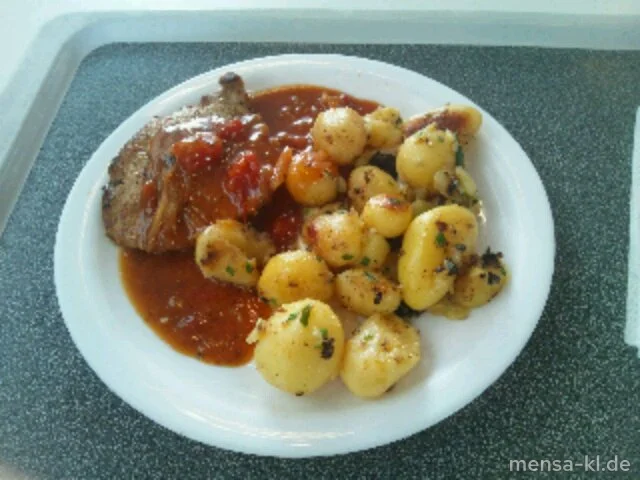 Schweinerückensteak 'Provencial' (S) mit gebackenen Kartoffeln