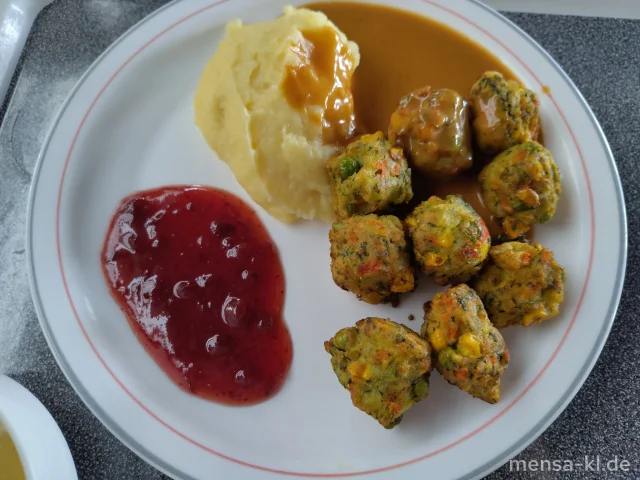 Gemüse-Köttbullar (Ei) mit Rahmsoße (Gl,La), Kartoffelpüree (5,La,Sw), Preiselbeeren (Sl) und Gurkensalat (1,3,5,Ei,La,Sw,Sf)