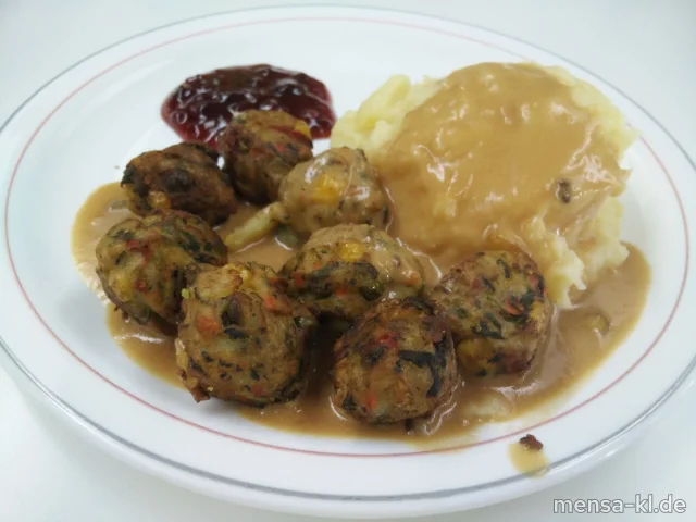 Gemüse-Köttbullar (Ei,V) mit Rahmsoße (La,V), Kartoffelpüree (La,V), Preiselbeeren (V) und Gurkensalat (1,3,5,Ei,La,Sw,Sf,V)