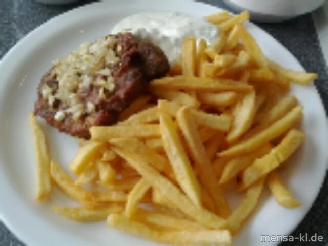 Schweinekammsteak "Gyros Art" (S) mit Pommes-Frites, Tzatziki und Krautsalat
