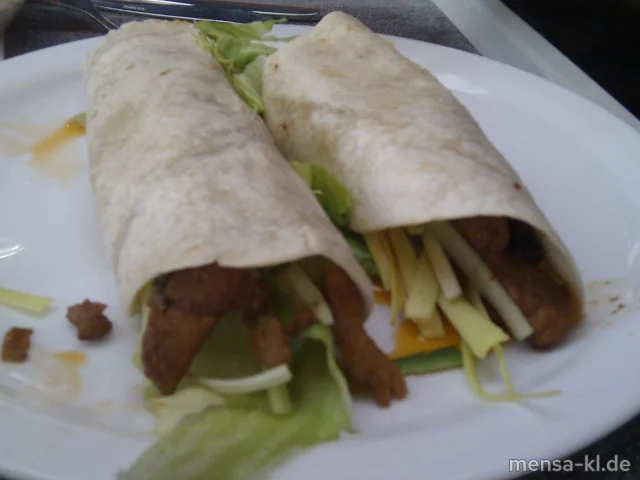 Schweinegeschnetzeltes (1) mit Frühlingszwiebeln, Eisbergsalat, Tortillas (2)