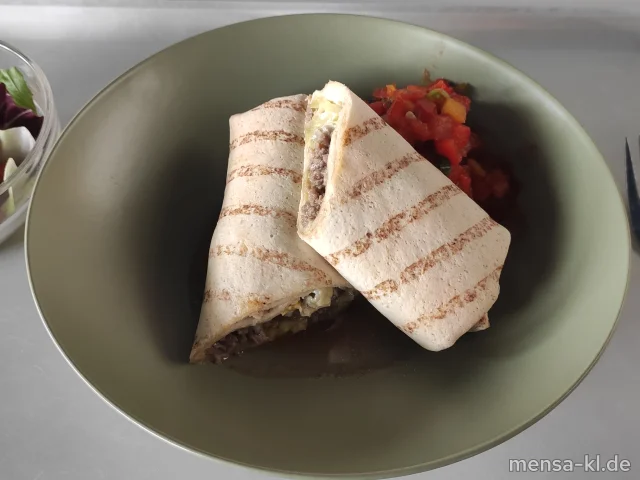 Wrap gefüllt mit Paprika, Eisberg, Gouda und Rinderhackfleisch (Gl,La,R), dazu Salsa und Salat (1,5,Sw)