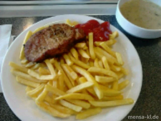 Schweinerückensteak 'Gyros Art' (S) mit Tzatziki, Pommes frites und Krautsalat