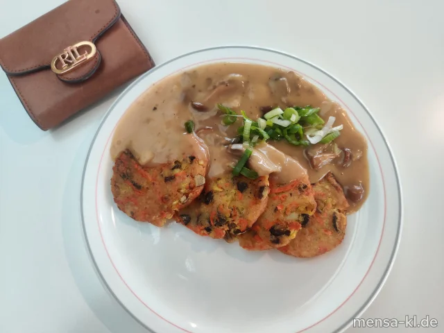 Karotten-Kürbiskern-Rösti, dazu Waldpilzpfanne (Sl,Sf) und ein Beilagensalat nach Wahl