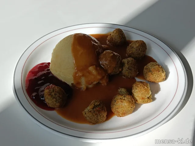 Falafel (Gl) mit Rahmsoße (Gl), Kartoffelpüree (5,Sw), Preiselbeeren und Gurkensalat (1,5,Sw,Sf)