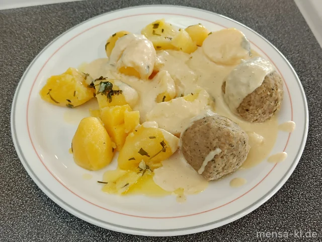 BIO Fleischknödel (Gl,Ei,R,S) mit Meerrettichsoße (1,5,Gl,La,Sw,Sf) und Petersilienkartoffeln (5,Sw), dazu einen Beilagensalat nach Wahl