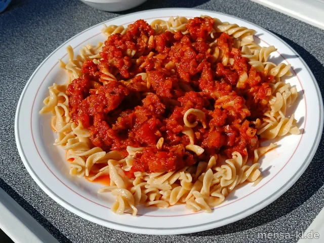 Bolognese mit Wurzelgemüse und Waldkräutern (Sl), dazu Vollkorn-Fusilli (Gl) und einen Beilagensalat nach Wahl