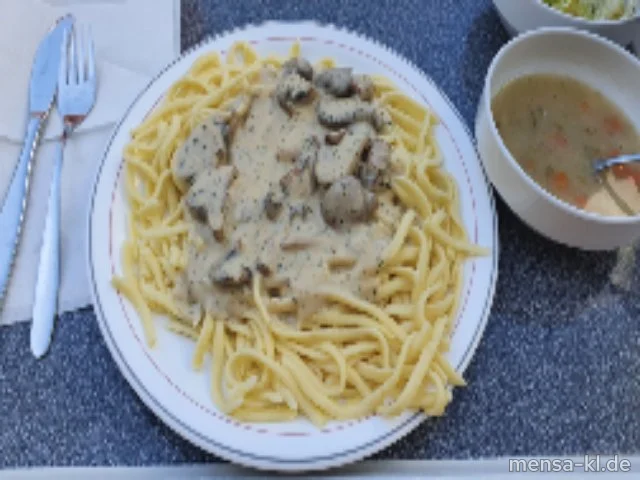 Steinchampignons in Kräuterrahm (Gl,La,V), Spätzle (1,Gl,Ei,V) und Salat (V)