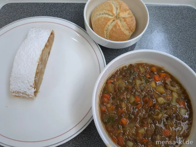 Linseneintopf (1,5,Sw) mit einem Weizenbrötchen (Gl,So), dazu ein Stück Apfelstrudel mit Puderzucker (Gl)
