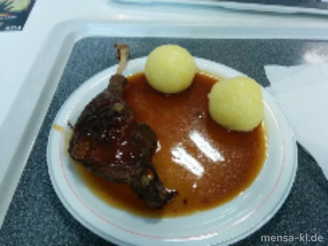 Geschmorte Gänsekeule (G,Lfrei,A) mit Kartoffelknödel (2,3,Lfrei)