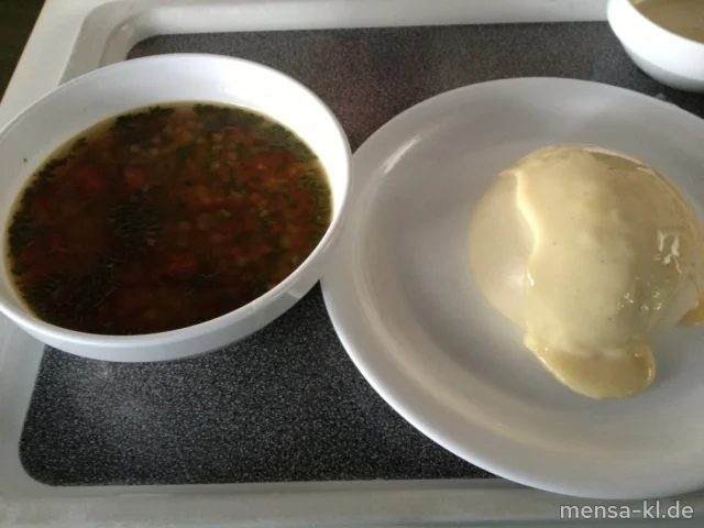 Klare Gemüsesuppe mit Spinatnockerl (V), dazu Powidlgermknödel (V) mit Vanillesoße (V)