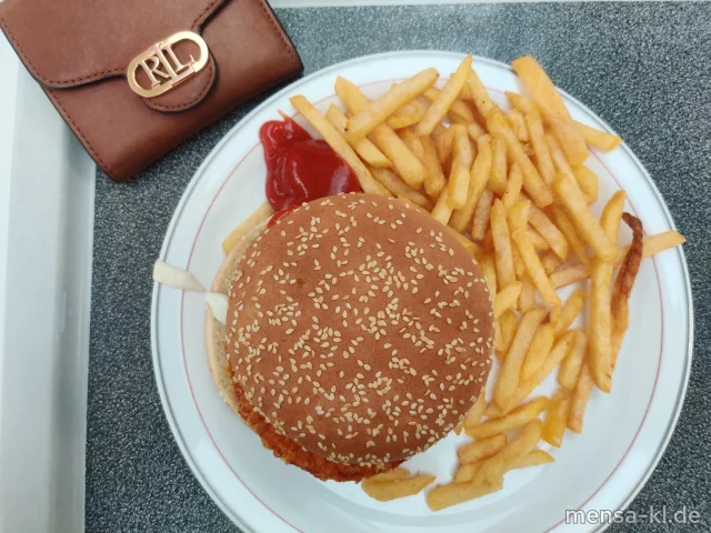 Crispy-Chicken-Burger (Gl,Sl,G) mit Koriander-Ingwer-Dip (Sf) im Burgerbrötchen (Gl,Se), dazu Pommes frites und Salat
