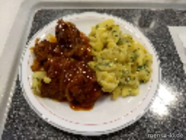 Winzerknorze (5,Sw,Sf,A,S) mit Schmorzwiebelsoße und Kartoffelsalat (1,5,Gl,Sw,Sf)
