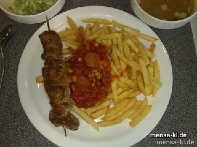 Fleischspieß (S/4) "Balkan Art" mit Pusztasoße (9), Pommes-Frites und Salat