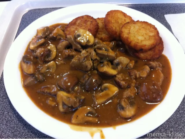 Schweinelende-Geschnetzeltes "Züricher Art" (S) mit frischen Champignons, Rösti (2)