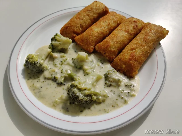 Vier Kartoffeltaschen mit Frischkäse gefüllt (La,V), dazu Broccoli-Rahmgemüse (Gl,La,V) und Salat (V)