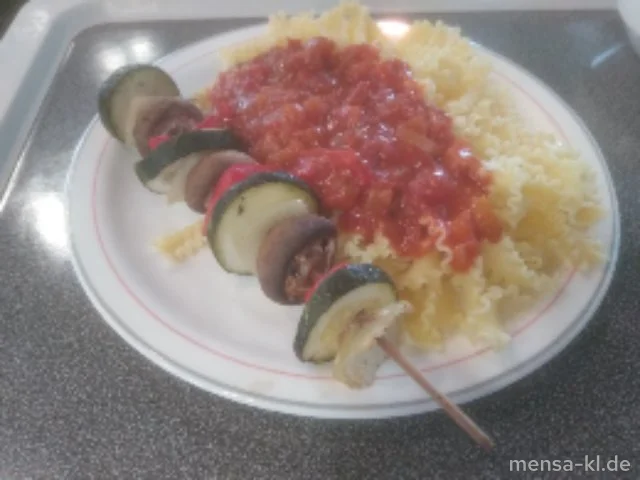 Blumenkohl-Käse-Medaillon (Gl,Ei,La,V) mit Paprika-Tomatensoße (Gl,V), Eiernudeln (1,Gl,Ei,V) und Salat (V)