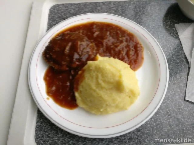 Frikadelle (Gl,Ei,S) mit Zwiebelsoße (Gl,Sf), Grumbeer-Stampes (5,La,Sw) und Erbsen-Karotten-Gemüse (La)