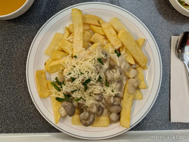 Große Portion Steakhouse-Fries mit Steinchampignonsoße (Gl,So), veganer Mozzarella, Petersilie und Salat