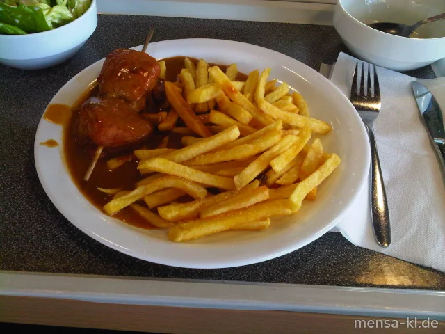 Zwei Schweinelende-Medaillons (S) mit Rahmsoße, Pommes-Frites und Salat