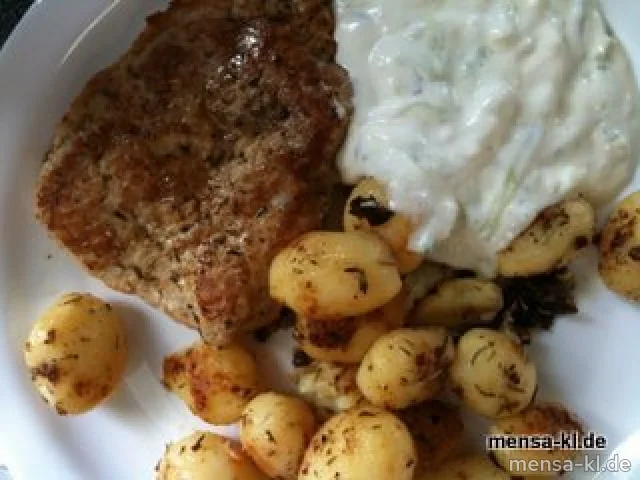 Schweinerückensteak "Gyros Art" mit Tzatziki und gebackenen Kartoffeln