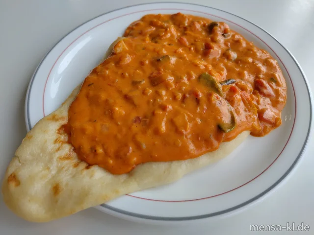 Veganes Tomaten-Curry (1,2,Gl,Sf), dazu Naanbrot (Gl) und einen Beilagensalat nach Wahl
