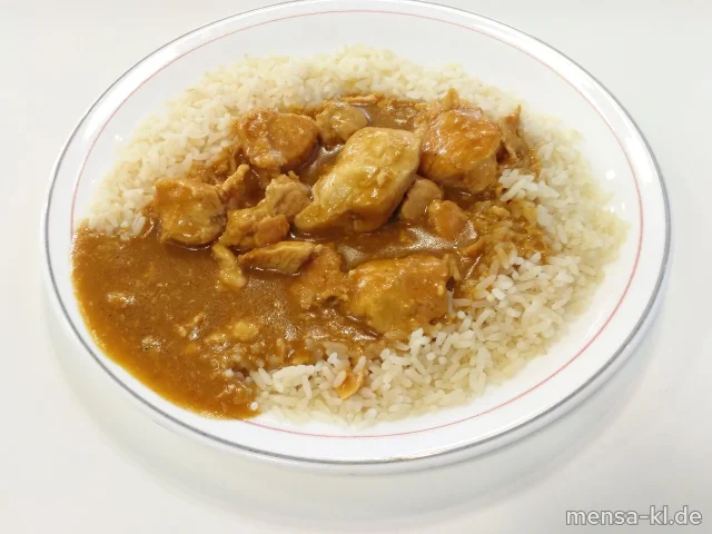 Hähnchenwürfel (G) in Erdnusssoße (En), Reis und Salat