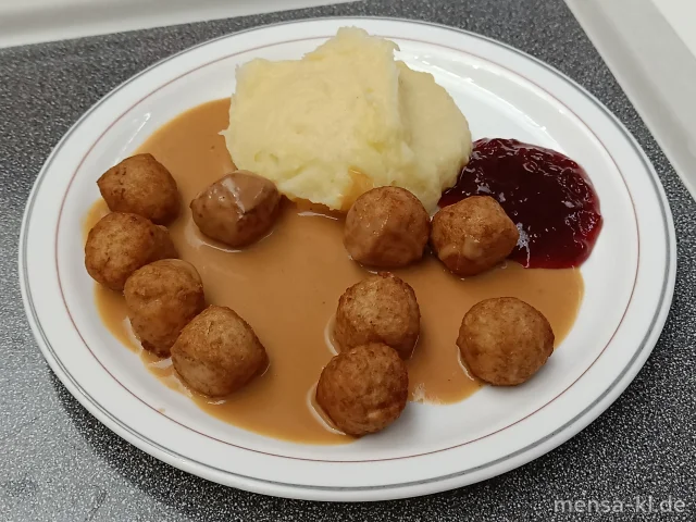 Geflügel-Köttbullar (Gl,Ei,G) mit Rahmsoße (Gl,La), Kartoffelpüree (5,La,Sw), Preiselbeeren und Gurkensalat (1,3,5,Ei,La,Sw,Sf)