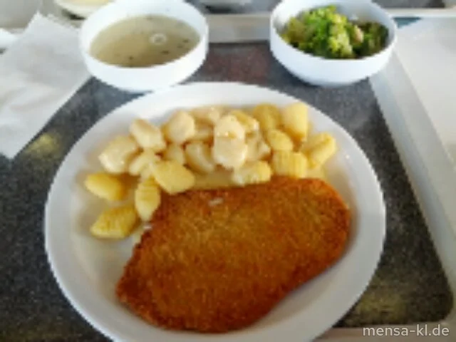 Paniertes Hähnchenbrustfilet (G) mit Käsesoße (1,2), Gnocchi und Broccoli-Gemüse