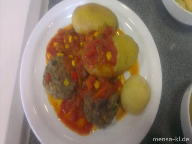 Zwei Köfta (Rinderhacksteak mit Gemüse und Hirtenkäse) (Gl,Ei,La,R) mit Pusztasoße (9,Sl), Pellissimo und Salat