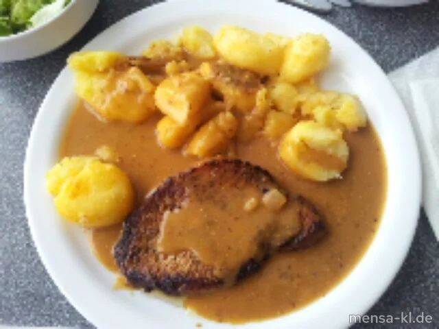 Schweinerückensteak (S) mit Dijonsenfsoße, gebackenen Kartoffeln und Salat