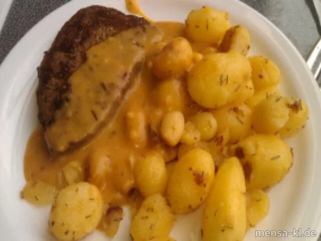Argentinisches Rumpsteak (R) mit Sauce Café de Paris, dazu Rosmarin-Kartoffeln