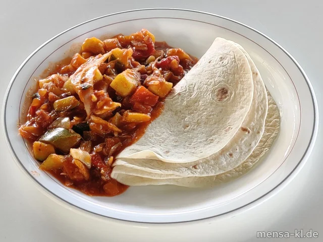 "Fajita Pueblo" mit Paprika, Zucchini und Zwiebeln (Gl,La,Sl,So,V), dazu Sour Cream-Dip (9,Gl,Ei,La,So,V), Tortillas (2,Gl,V) und Salat (V)