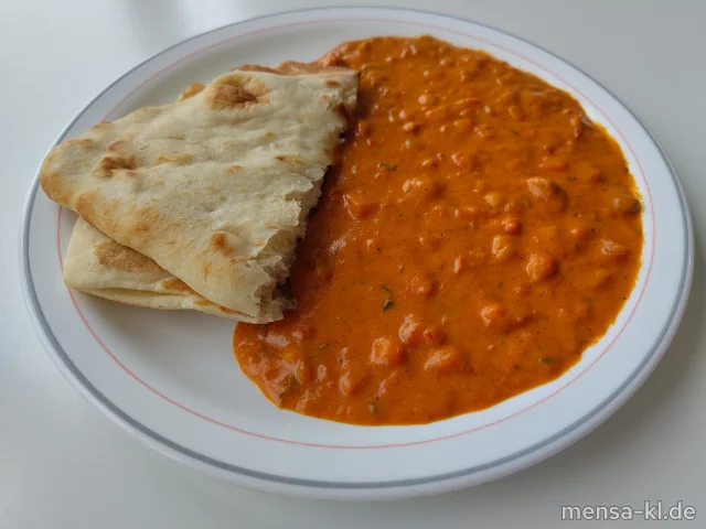 Veganes Tomaten-Curry mit Kichererbsen (1,2,Gl,Sf), dazu Naanbrot (Gl) und Salat