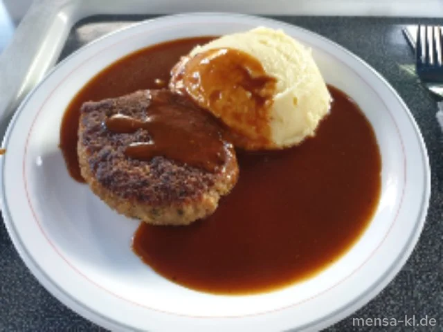 Pfälzer Fleischküchle (Gl,Ei,S) mit Bratensoße (Sf), Grumbeer-Stampes (5,La,Sw) und Salat