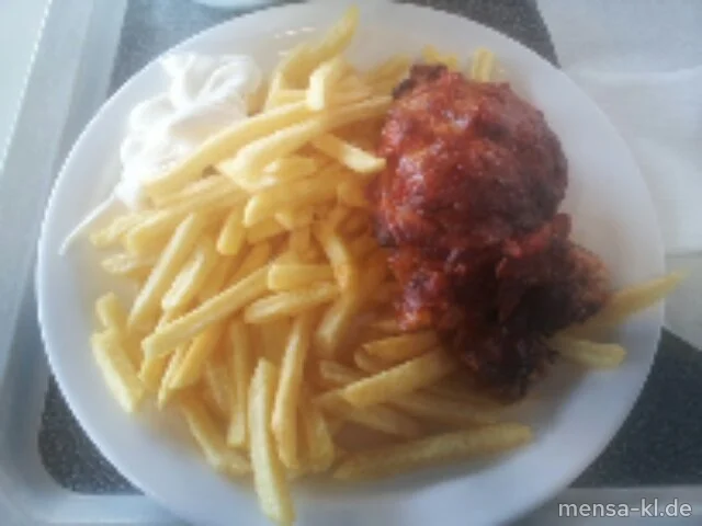 Schweinerückensteak (S) mit würziger Tomatenauflage und Mozzarella überbacken, Pommes frites und Salat