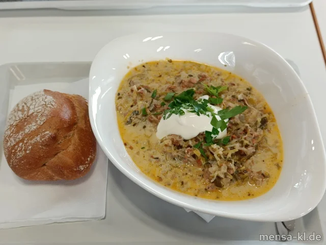 Käse-Lauch-Eintopf mit Hackfleisch (2,Gl,La,So,R,S), dazu ein Roggenbrötchen (Gl,Se,So)