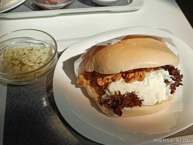 Putengyros im Fladenbrot (Gl,Se,G) mit Tzatziki (La) und Krautsalat (1,5,Sw)