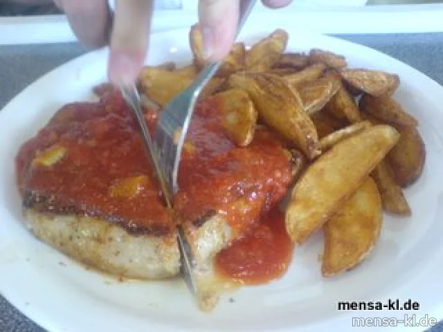 Schweinerückensteak "Mexiko" mit einer feurigen Soße und Potato-Wedges 