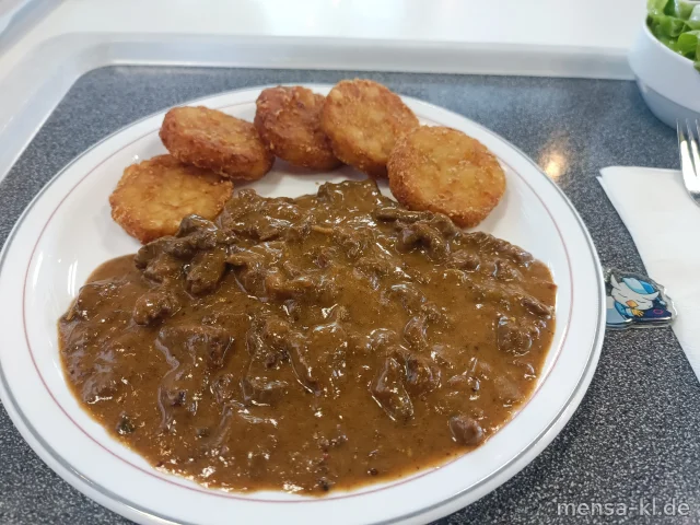 Rindergeschnetzeltes "Stroganoff" (9,Gl,La,Sf,R) mit Röstinchen, dazu Salat
