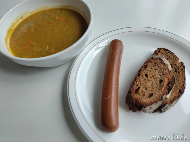 Erbseneintopf (Gl,Sl), dazu eine pflanzliche Brühwurst (1), Bauernbrot (Gl) und ein Beilagensalat nach Wahl