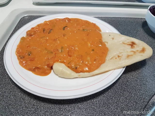 Veganes Tomaten-Curry (1,2,Gl,Sf), dazu Naanbrot (Gl) und einen Beilagensalat nach Wahl
