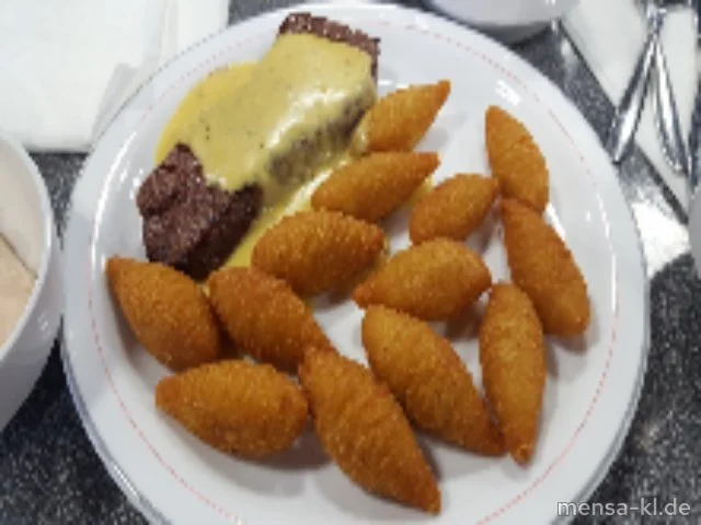 Südamerikanisches Rumpsteak (R) mit Sauce Café de Paris (1,Gl,Ei,La,Sf,A), Zapfenkroketten und bunter Blattsalat