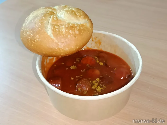 Rindswurst (1,2,3,8,9,Sf,R) mit Currysoße (Sl,Sf), dazu ein Kaiserbrötchen (Gl)