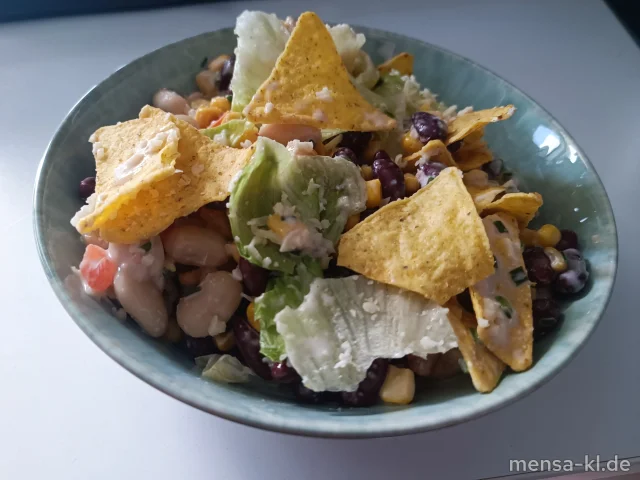 Mexikanischer-Salat mit Gouda, Tomaten, Bohnen, Mais und Eisberg (3,La), dazu Kräuter-Dressing (1,3,5,Sw,So)